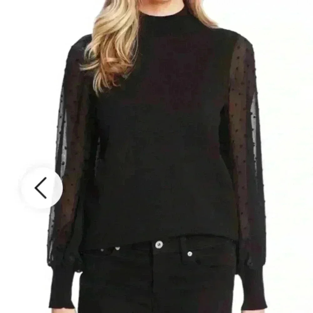 CeCe black sweater with polkadot sleeves